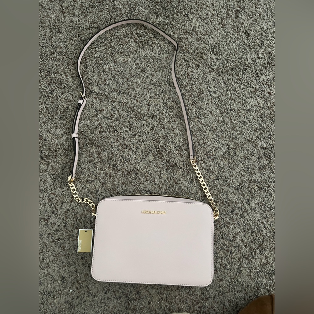 Michael Kors light pink new with tags cross body purse